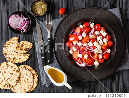 tomato salad with red onion and white cheese 111210096