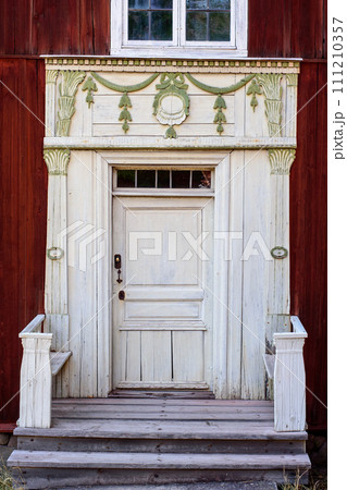 Entrance of traditional timber house in Sweden Entrance of traditional timber house in Sweden 111210357