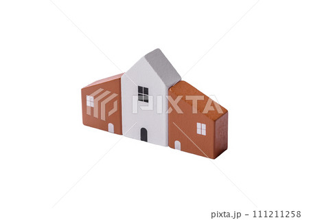 A small wooden house and keys as an idea for investing in your own home 111211258