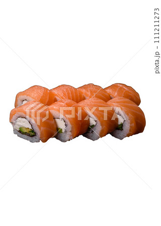 Delicious Philadelphia sushi roll with salmon, shrimp, cucumber and cream cheese Delicious Philadelphia sushi roll with salmon, shrimp, cucumber and cream cheese 111211273