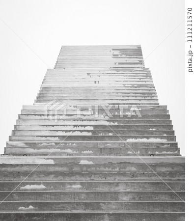 Stairs to nowhere. Empty unfinished bridge. Outdoor staircase without end. Stairway to heaven. Bridge under construction. Stairs against cloudy sky. Steps to heaven. Lifestyle background. Stairs to nowhere. Empty unfinished bridge. Outdoor staircase without end. Stairway to heaven. Bridge under construction. Stairs against cloudy sky. Steps to heaven. Lifestyle background. 111211570