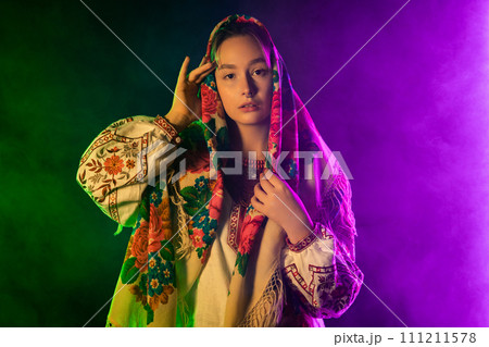Modern young woman in traditional ukrainian handkerchief. Ukraine, style, folk Modern young woman in traditional ukrainian handkerchief. Ukraine, style, folk 111211578