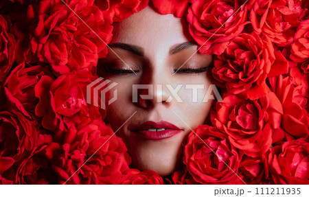 Portrait beautiful woman face with perfect make-up in roses flowers decoration Portrait beautiful woman face with perfect make-up in roses flowers decoration 111211935