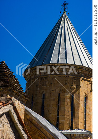 Medieval castle Ananuri in the Caucasus mountains of Georgia 111212560