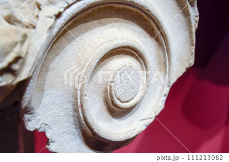 Curl, part of the ornament of antique bas relief on a marble slab. Curl, part of the ornament of antique bas relief on a marble slab. 111213082