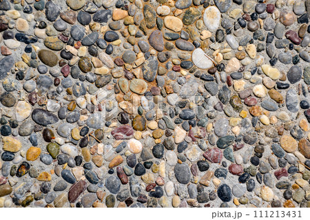 Background texture of the pavement of stone pellets Background texture of the pavement of stone pellets 111213431
