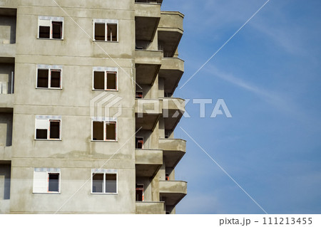 Unfinished new high rise buildings. Building against the blue sky. 111213455