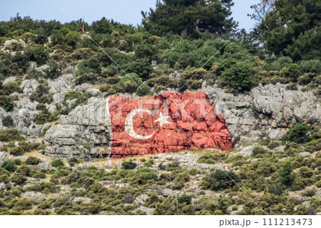 Flag of Turkey drawn on the rocks 111213473
