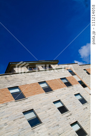 Modern Stone and Brick Facade Under Blue Sky in Bloomington 111214058