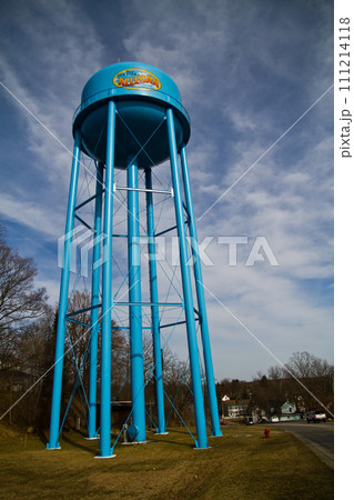 Blue Allegan Water Tower Against Dynamic Sky in Semi-Rural Community Blue Allegan Water Tower Against Dynamic Sky in Semi-Rural Community 111214118