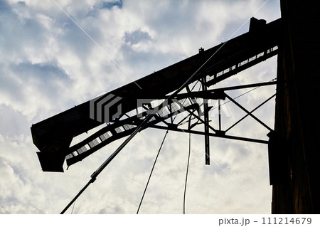 Industrial Crane Silhouette Against Cloudy Sky, Abandoned Ohio Elevator 111214679