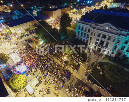 Aerial Urban Festival at Night with Historic Courthouse Background Aerial Urban Festival at Night with Historic Courthouse Background 111214757