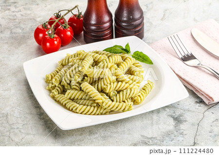 Italian pasta with basil pesto Italian pasta with basil pesto 111224480