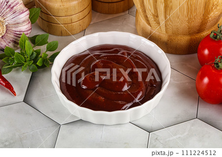 Tasty barbecue sauce in the bowl Tasty barbecue sauce in the bowl 111224512