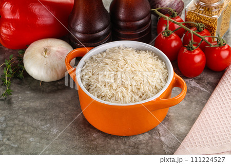 Raw delicous basmati rice heap 111224527