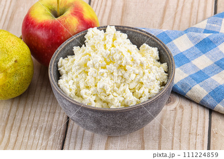 Organic cottage cheese in the bowl 111224859