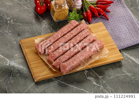 Raw beef kebab sausage for grill 111224991