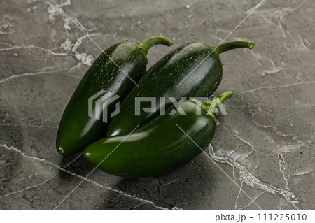 Raw green Mexican jalapeno pepper Raw green Mexican jalapeno pepper 111225010
