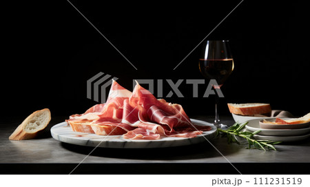 Thinly sliced prosciutto, a savory Italian cured meat, a flavorful addition to gourmet platters Thinly sliced prosciutto, a savory Italian cured meat, a flavorful addition to gourmet platters 111231519