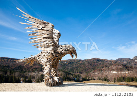 Wooden sculpture of an eagle. Italian landmark Wooden sculpture of an eagle. Italian landmark 111232102