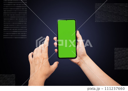 Hands hold the phone with a green chromaque, the rear black blue background Hands hold the phone with a green chromaque, the rear black blue background 111237660