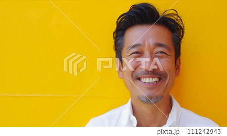 Asian elderly man on a yellow background. 111242943