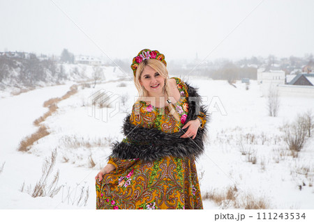 beautiful Russian girl in a winter national dress beautiful Russian girl in a winter national dress 111243534