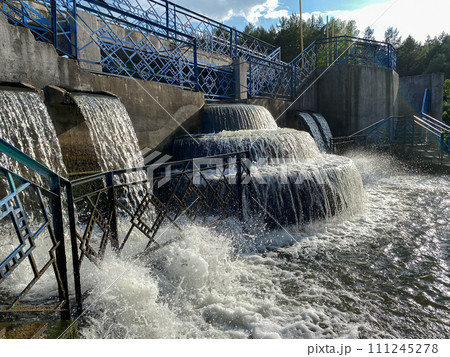 Fountain made like a cascade. Water falls beautifully and the foam occurs. Small architectural form 111245278