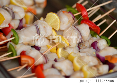 Grilled scallops barbecue with lemon and Pepper Grilled scallops barbecue with lemon and Pepper 111245406
