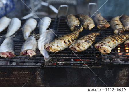 fried herring on the grill 111246040