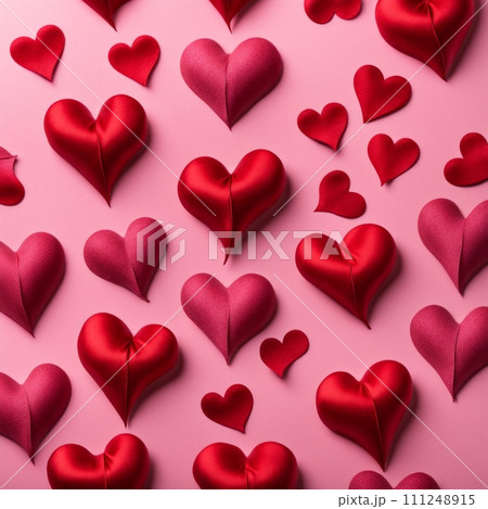 Red silk hearts on a pink concrete background 111248915