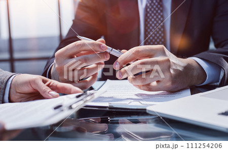 The concept of signing documents and hiring employees. 111254206