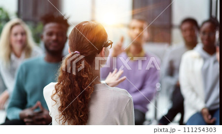 young business woman giving a presentation in a conference room. 111254303