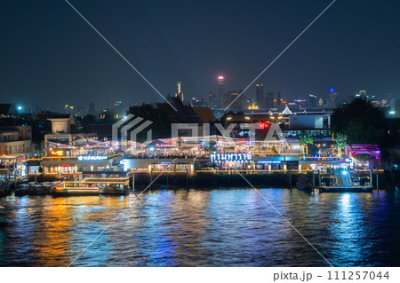 Aerial view of Bangkok Downtown Skyline with Chao Phraya River, Thailand. Financial district and business centers in smart urban city in Asia. Skyscraper and high-rise buildings. 111257044