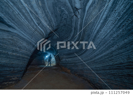 Blue cave with rocks, Mae Sot District, Tak, Thailand. Cave wall color pattern with natural landscape. Tourist attraction landmark. 111257049