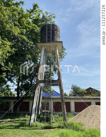 old water tank made from concrete in thailand.	 111257226