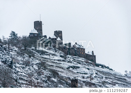 Winter at Burg Thurant Castle at the Mosel vineyards nestled in the hills above the Moselle River Germany Town Alken Winter at Burg Thurant Castle at the Mosel vineyards nestled in the hills above the Moselle River Germany Town Alken 111259287