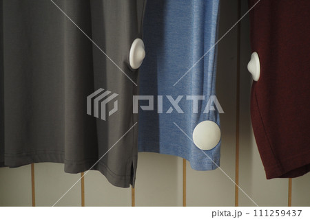 Clothing security tag on a shirt , Clothing security tag on a shirt , 111259437