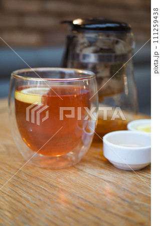 lemon tea and honey on table lemon tea and honey on table 111259438