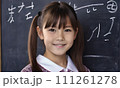 AI-generated content. little girl portrait smile, face little schoolgirl, little student educational institution, 7 years old, child kid girl sitting desk smile, team work, friends classmates, work 111261278