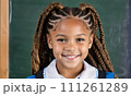 AI-generated content. little girl portrait smile, face little schoolgirl, little student educational institution, 7 years old, child kid girl sitting desk smile, team work, friends classmates, work 111261289