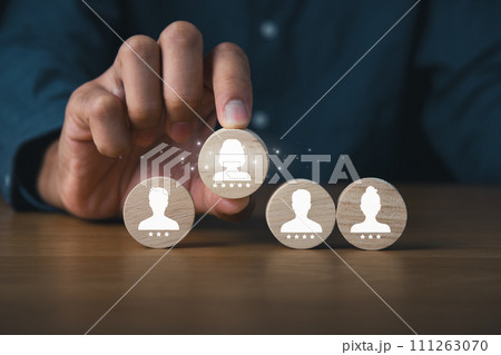 HR Human Resource searching new employee,Business and HR recruit concept.Business man holding wooden of candidate. HR Human Resource searching new employee,Business and HR recruit concept.Business man holding wooden of candidate. 111263070