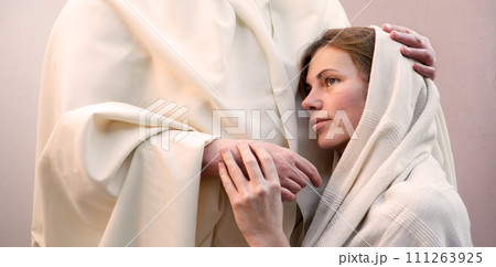 Jesus hugging a praying woman Jesus hugging a praying woman 111263925