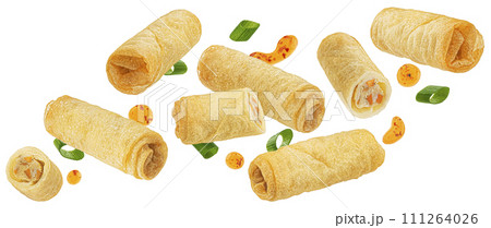 Traditional fried spring rolls with hot chili pepper sauce drops isolated on white background with clipping path Traditional fried spring rolls with hot chili pepper sauce drops isolated on white background with clipping path 111264026