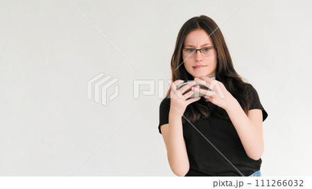 Mobile gaming. Gadget fun. Online entertainment. Excited anxious woman enjoying playing on phone isolated on white empty space background. 111266032