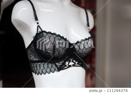 Closeup of black bra on mannequin in a fashion store showroom 111266378