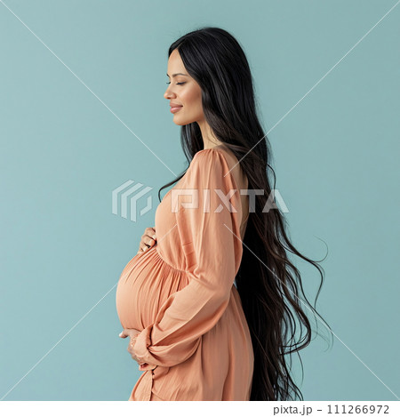 Expecting Mother in Peach Fuzz Colored Dress 111266972