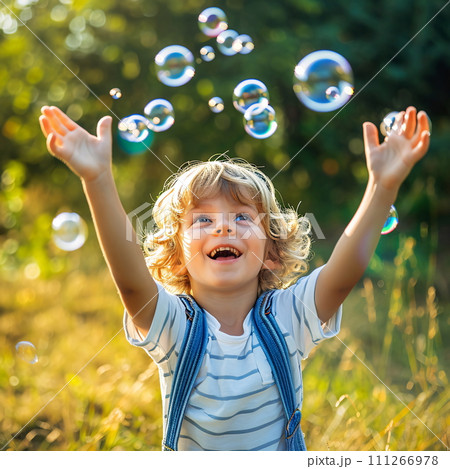 Child Reaching for Bubbles in Nature 111266978