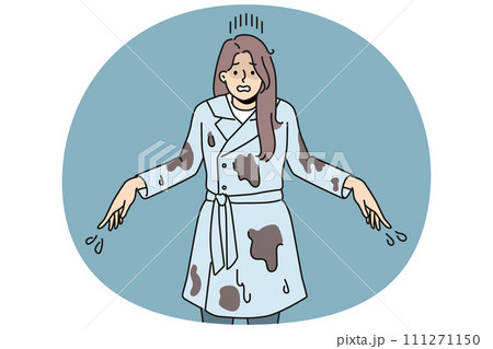 Stressed woman in mud after falling in puddle 111271150
