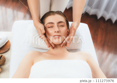 Caucasian woman enjoying relaxing anti-stress head massage. Quiescent 111273976